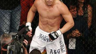 Mark Coleman срещу Tito Ortiz в UFC 106