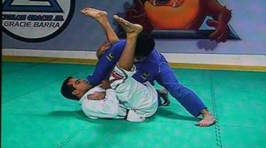 Helicopter sweep armbar